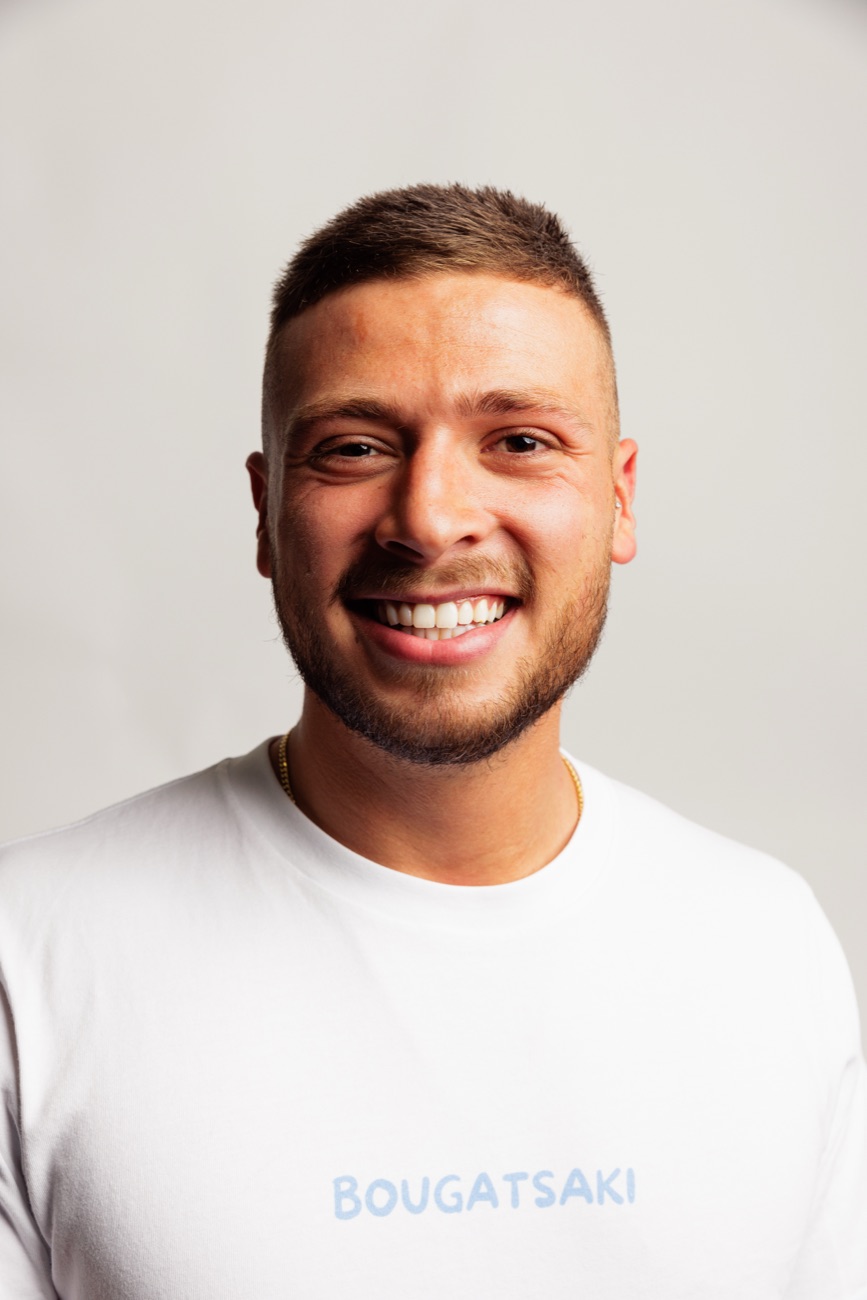 Kosta Kostidis, founder of Bougatsaki, in a branded t-shirt